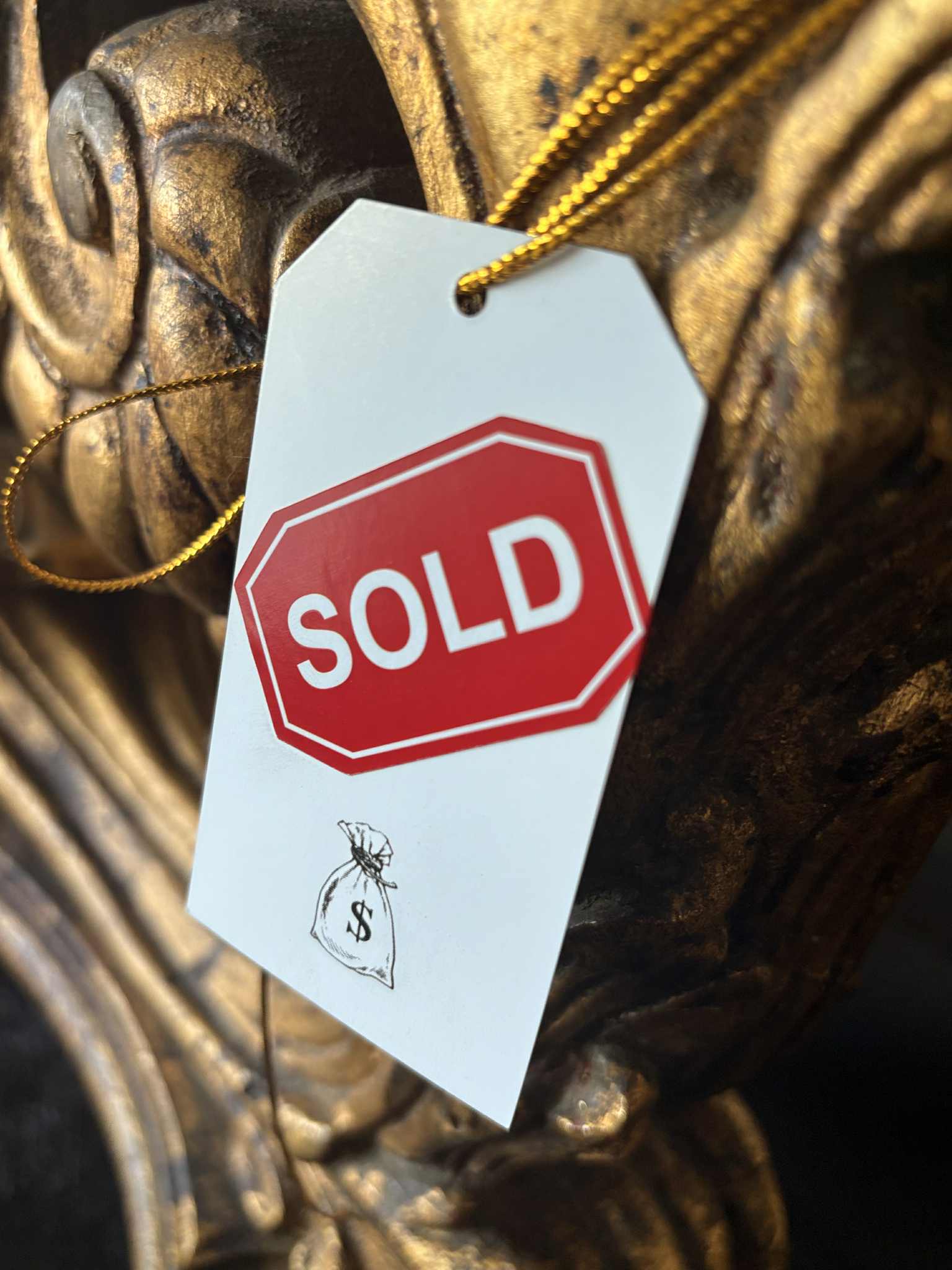 SOLD tag at Swan Estates sale